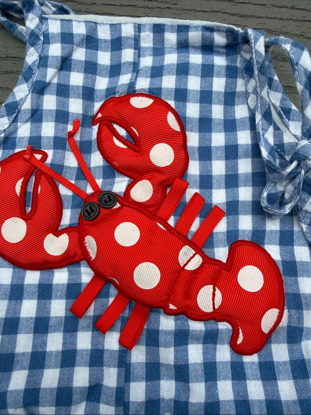 Mud Pie Blue Gingham Ruffle Strap Romper with Red Crab Applique